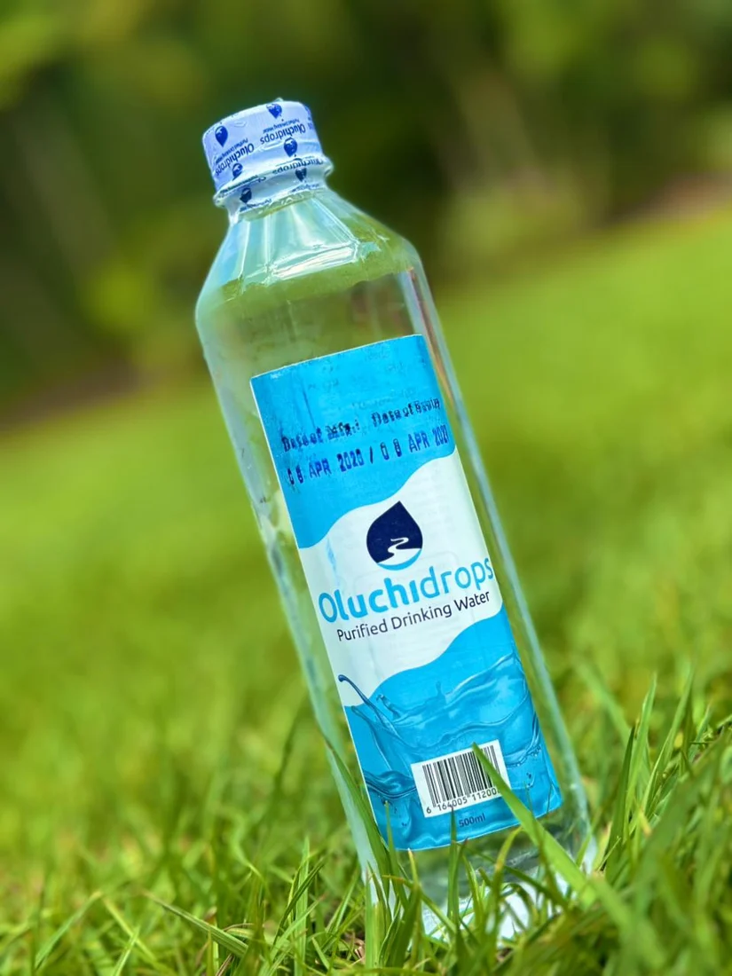 Oluchi Drops Executive purified drinking water bottle outdoors